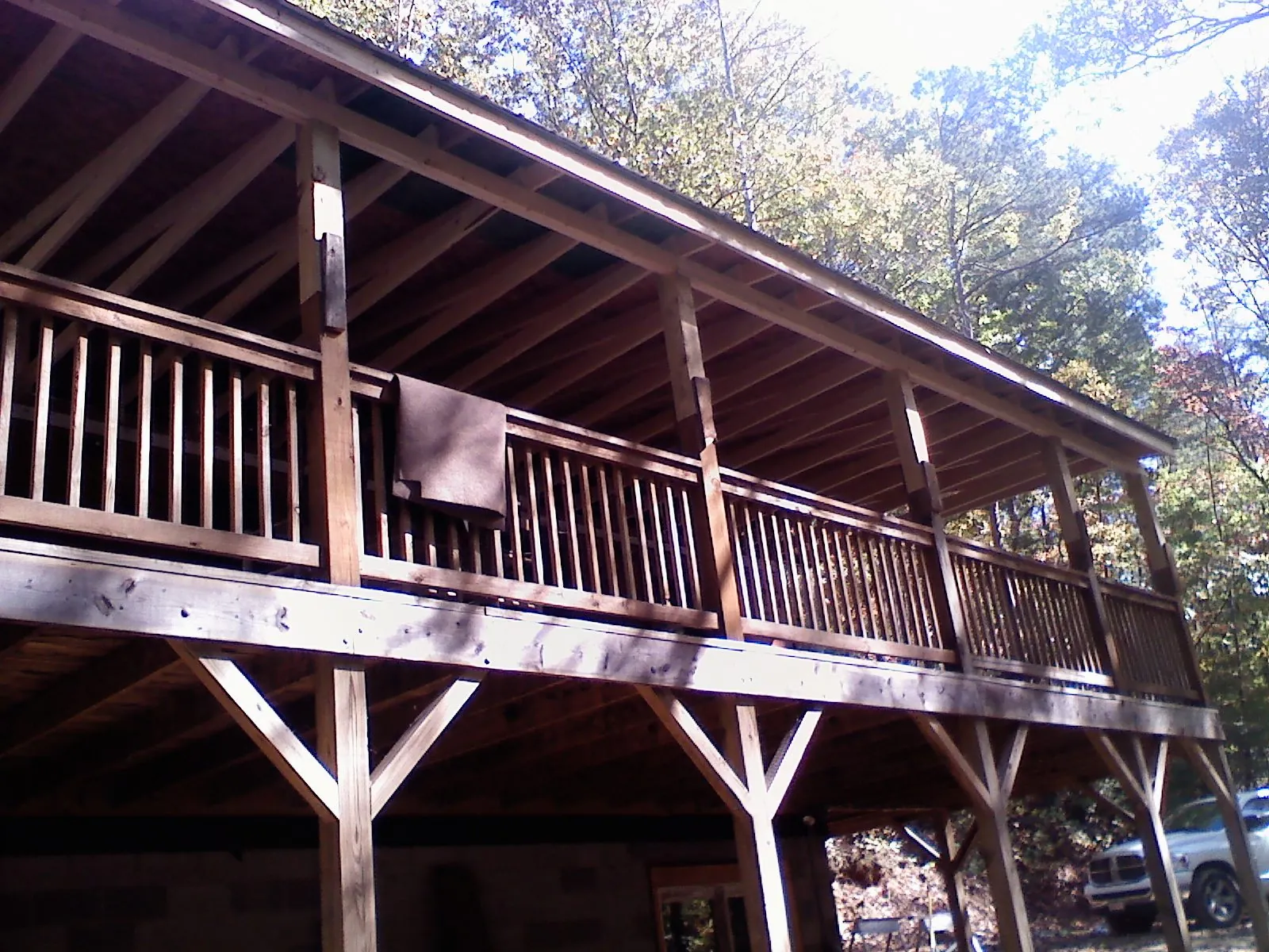 Timber framing under a new elevated porch and deck — Roof Leak Repair in Hopkinton by Roofing Brothers